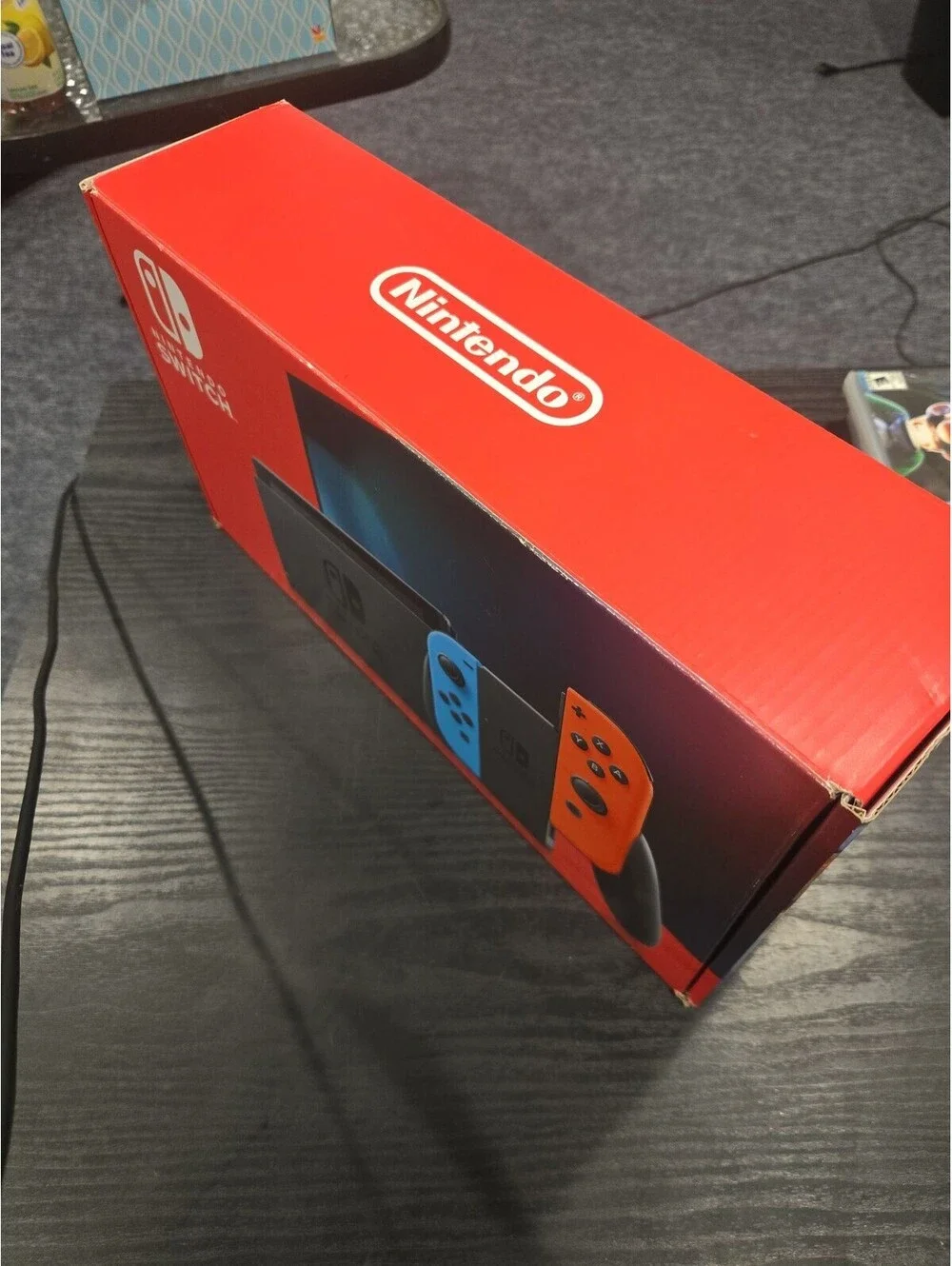 Nintendo Switch V2 Console Box with Neon Blue & Red Joy-Con